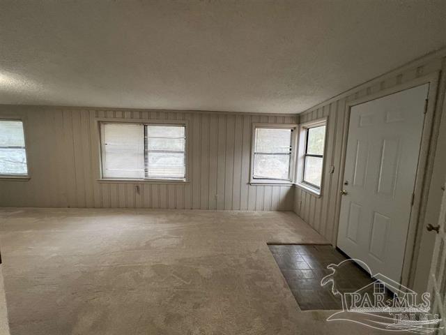 5733 Orange Street Milton, FL 32570 - Photo 8 of 32 an empty room with windows