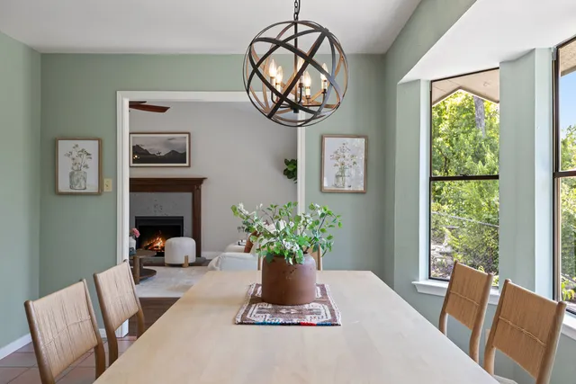a kitchen with stainless steel appliances a sink stove and cabinets