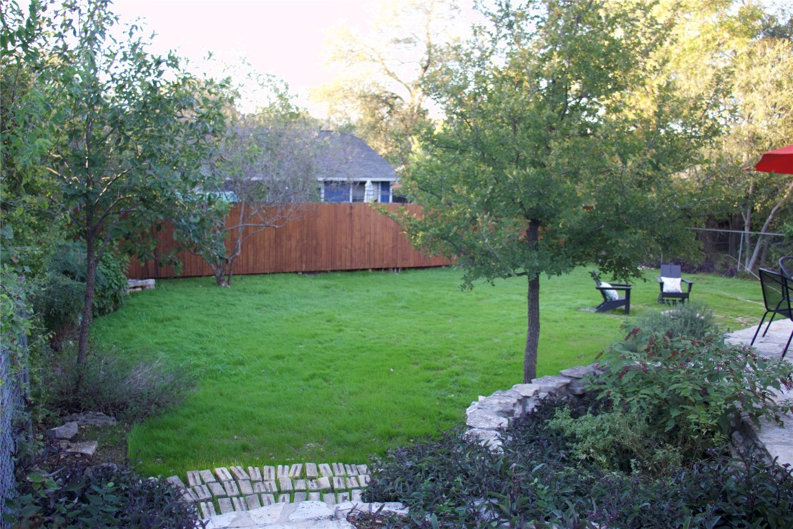 7812 Turquoise Trail Austin, TX 78749 - Photo 28 of 28 a view of a house with a backyard