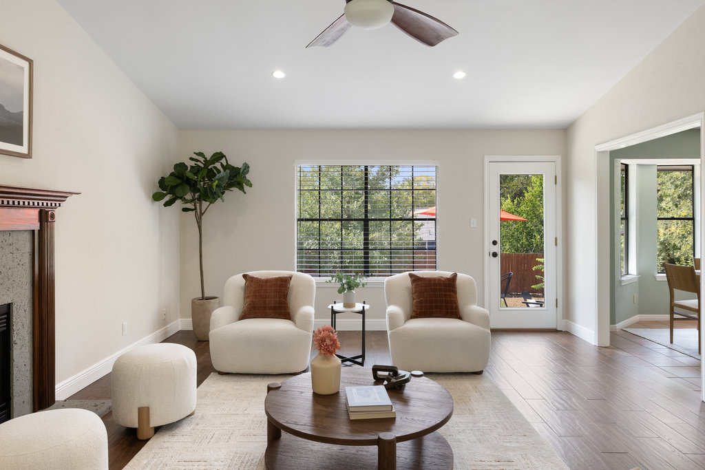 7812 Turquoise Trail Austin, TX 78749 - Photo 7 of 28 a living room with furniture and a large mirror