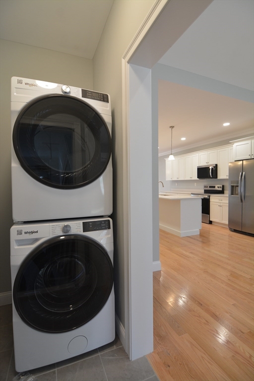 1 Depot Street, Unit 5 Townsend, MA 01469 - Photo 17 of 35 a utility room with washer and dryer