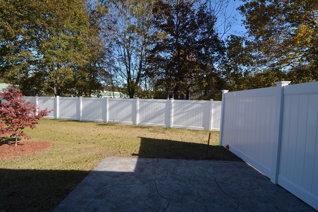 1 Depot Street, Unit 5 Townsend, MA 01469 - Photo 23 of 35 a view of a backyard
