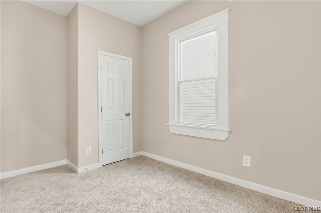 117 Spring Street Petersburg, VA 23803 - Photo 16 of 22 an empty room with a window