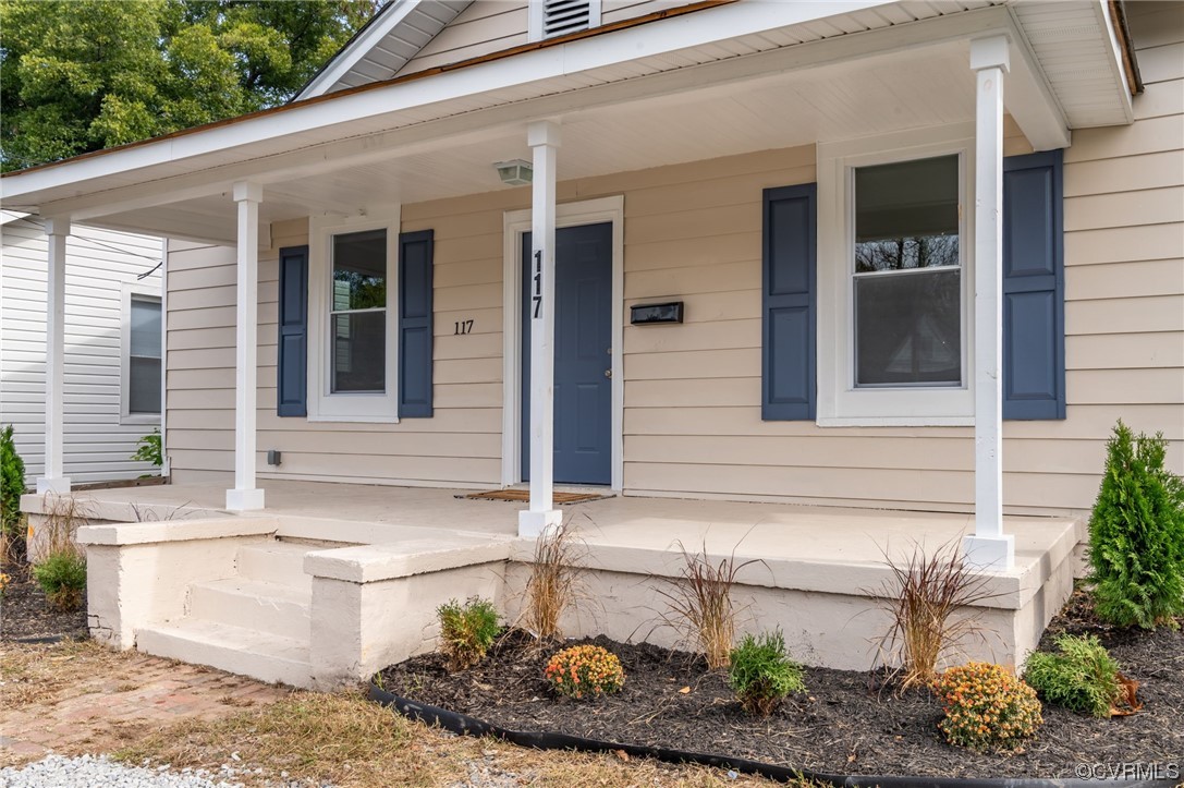 117 Spring Street Petersburg, VA 23803 - Photo 21 of 22 a front view of a house with a yard