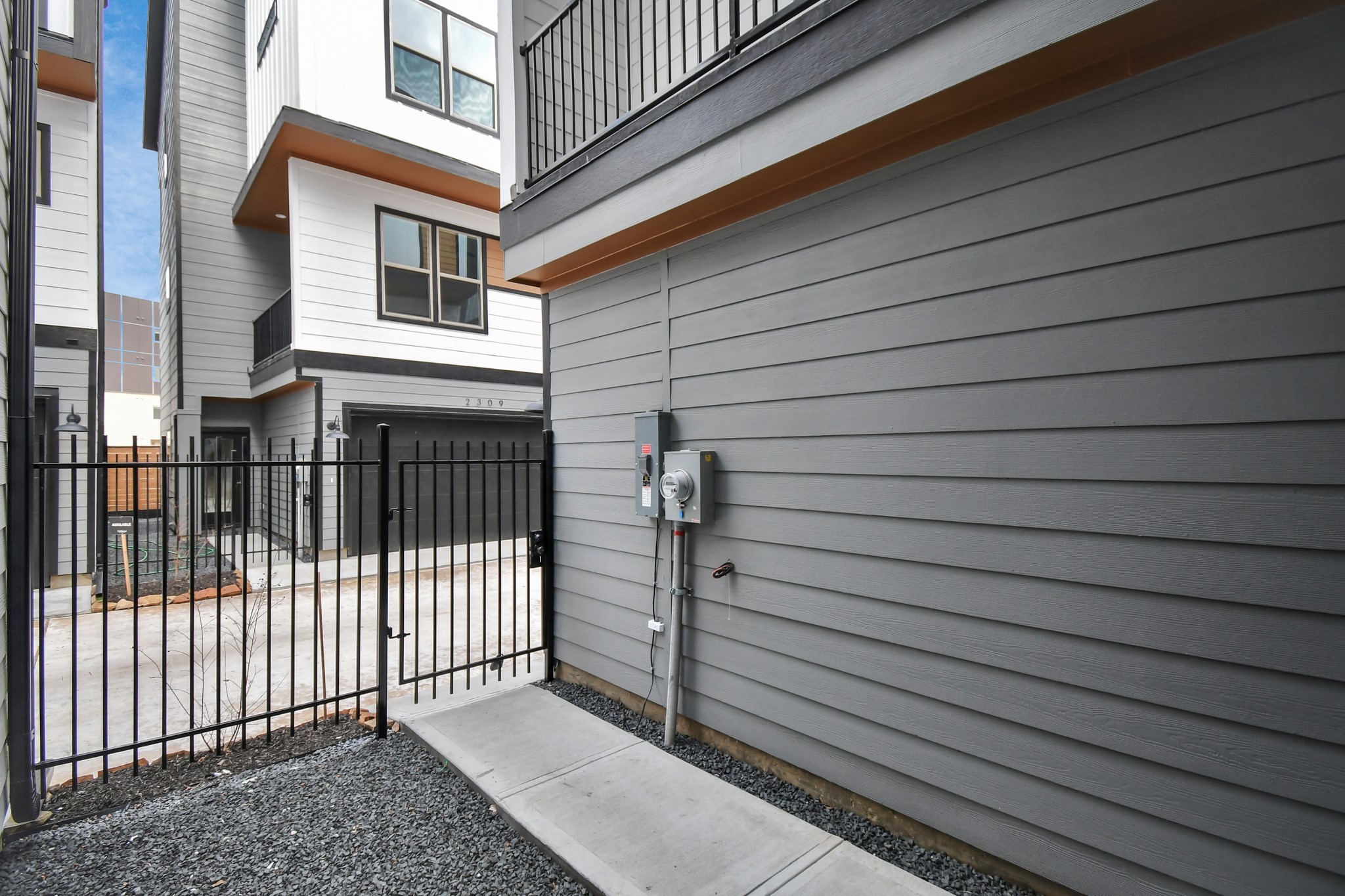 2335 Eagle Street Houston, TX 77004 - Photo 2 of 26 a view of a house with a wooden fence