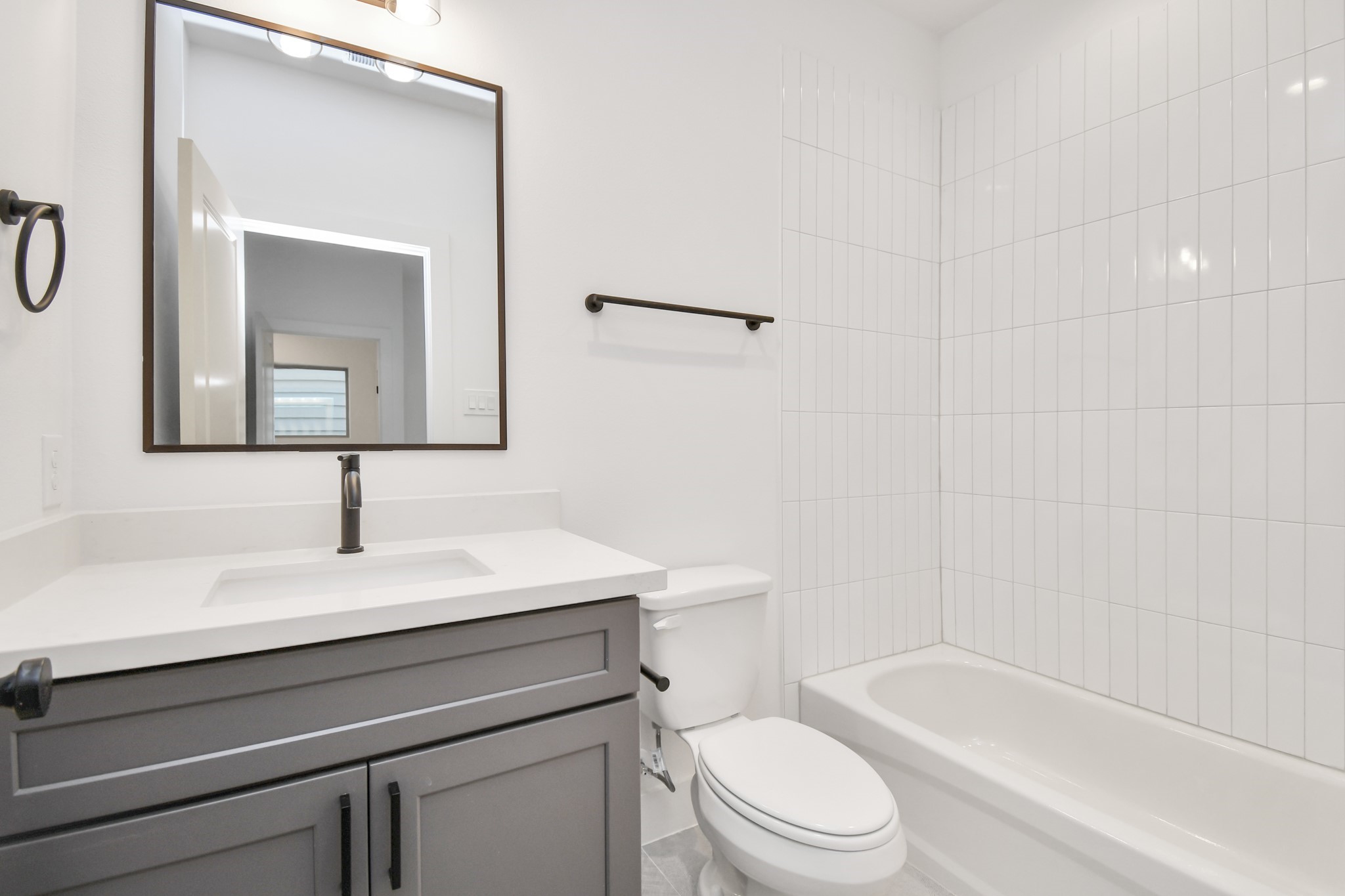 2335 Eagle Street Houston, TX 77004 - Photo 6 of 26 a bathroom with a sink toilet and shower