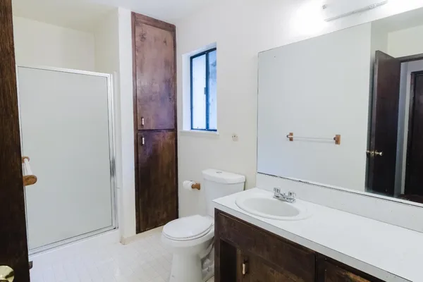 a kitchen with stainless steel appliances granite countertop a sink and a stove