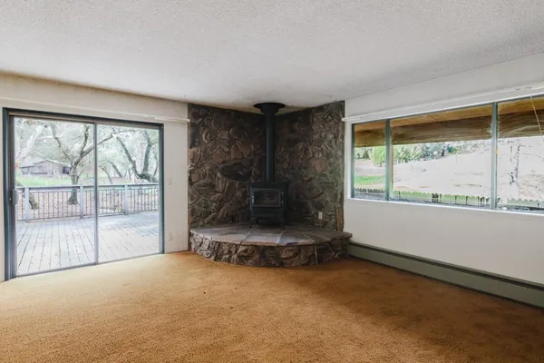 a view of kitchen with furniture and window
