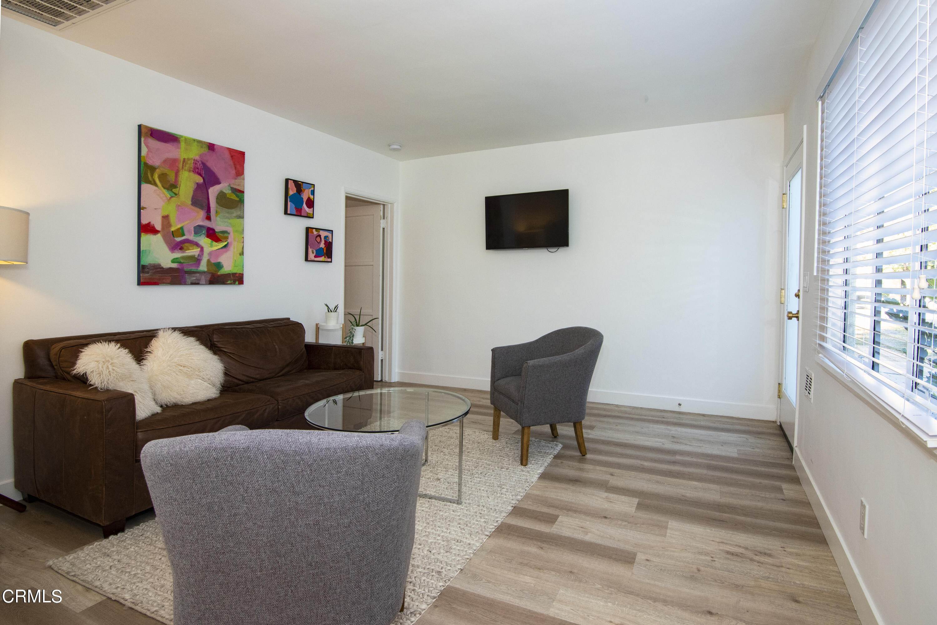 2935 Morningside Street Pasadena, CA 91107 - Photo 20 of 31 a living room with furniture and a wooden floor