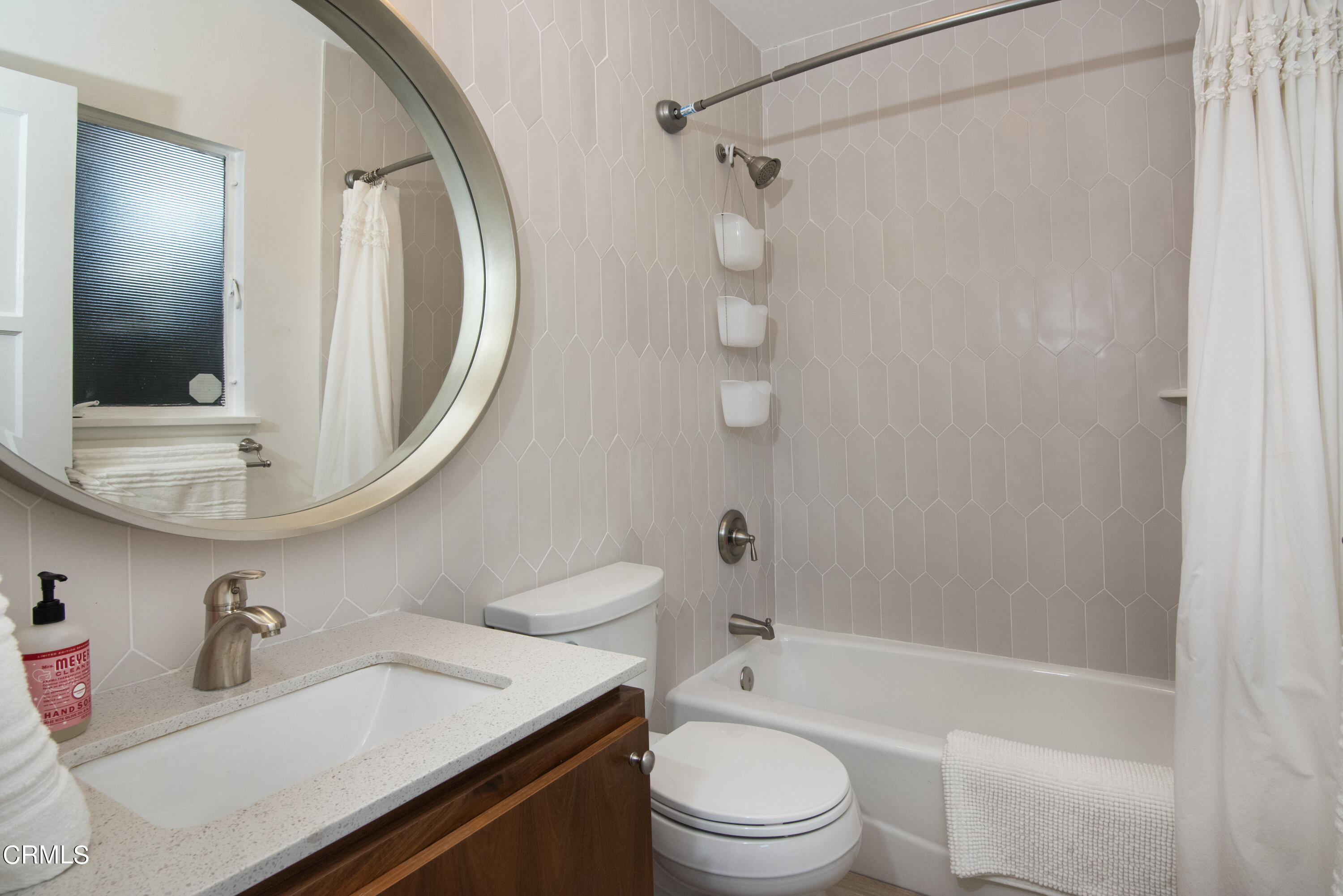 2935 Morningside Street Pasadena, CA 91107 - Photo 22 of 31 a bathroom with a sink toilet and shower