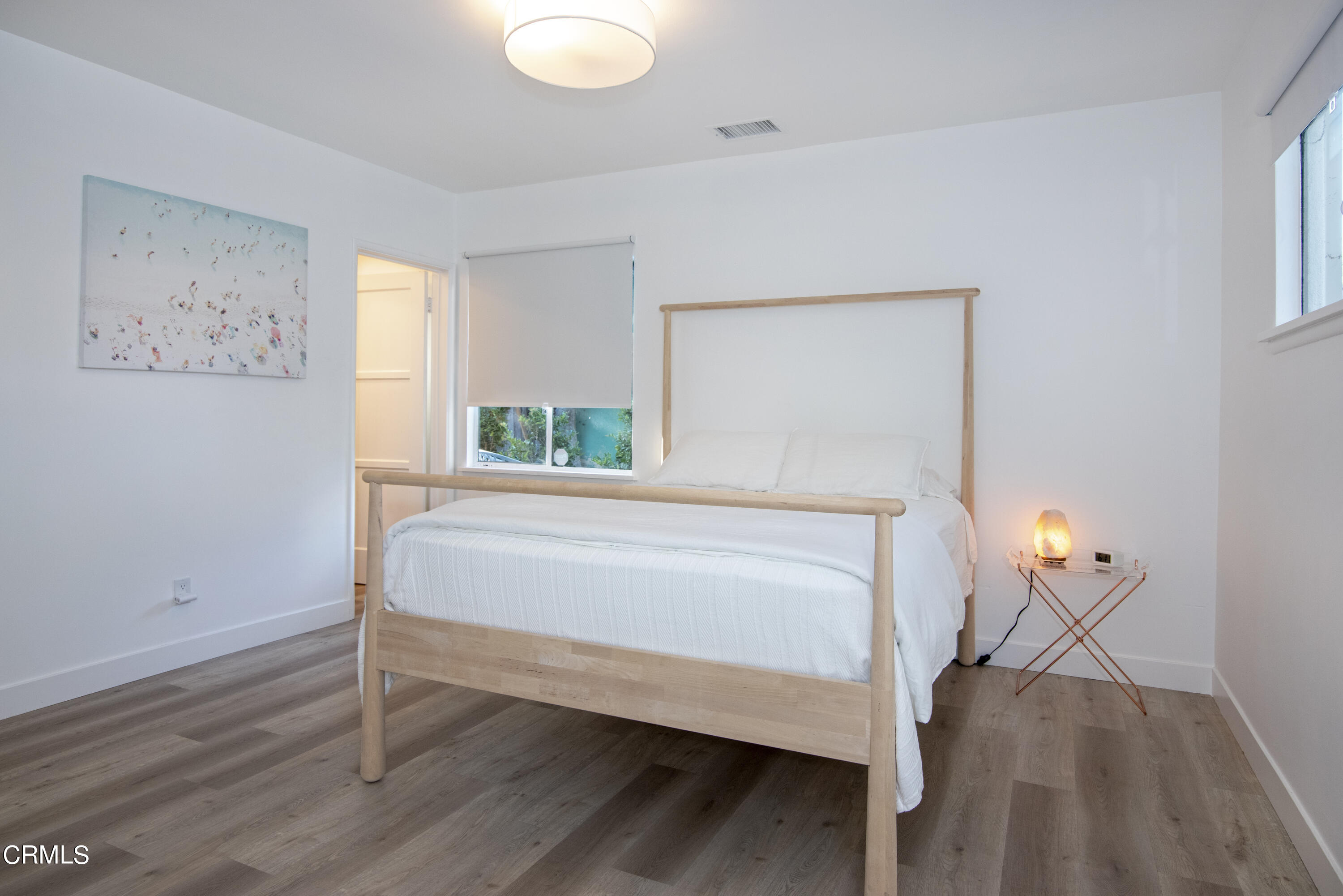 2935 Morningside Street Pasadena, CA 91107 - Photo 27 of 31 a bed sitting in a bedroom next to a window