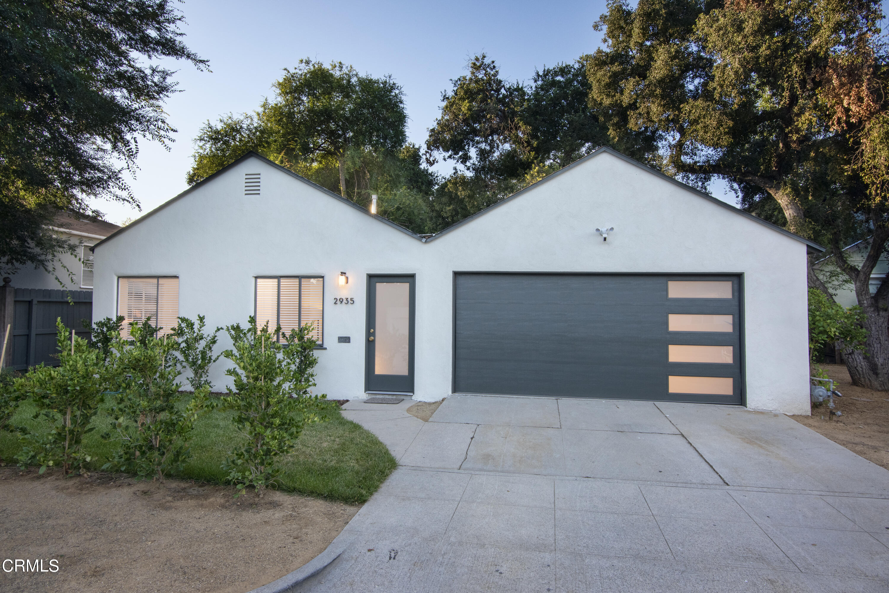 2935 Morningside Street Pasadena, CA 91107 - Photo 29 of 31 a view of a house with a yard and garage