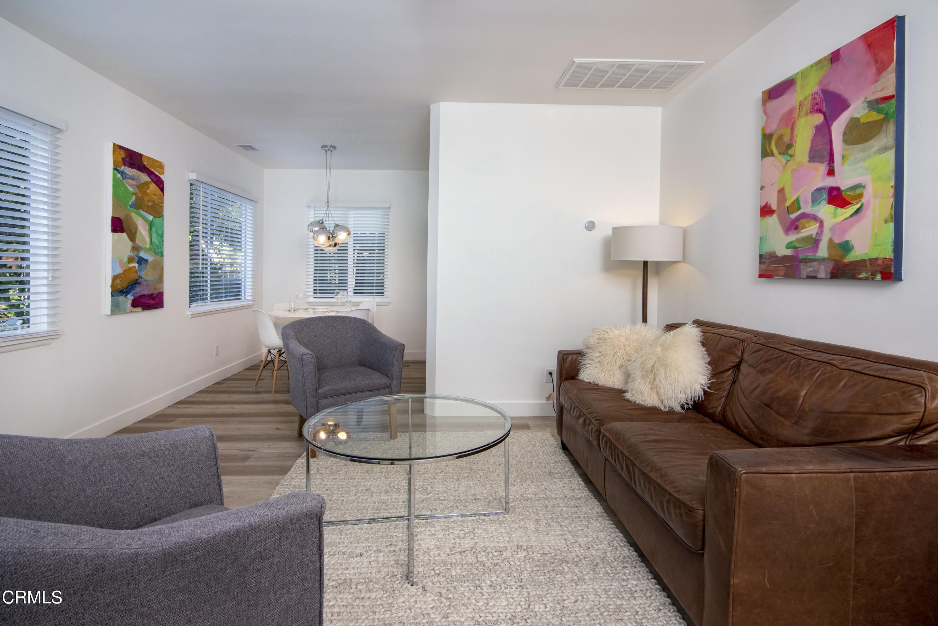 2935 Morningside Street Pasadena, CA 91107 - Photo 31 of 31 a living room with furniture and painting on the wall