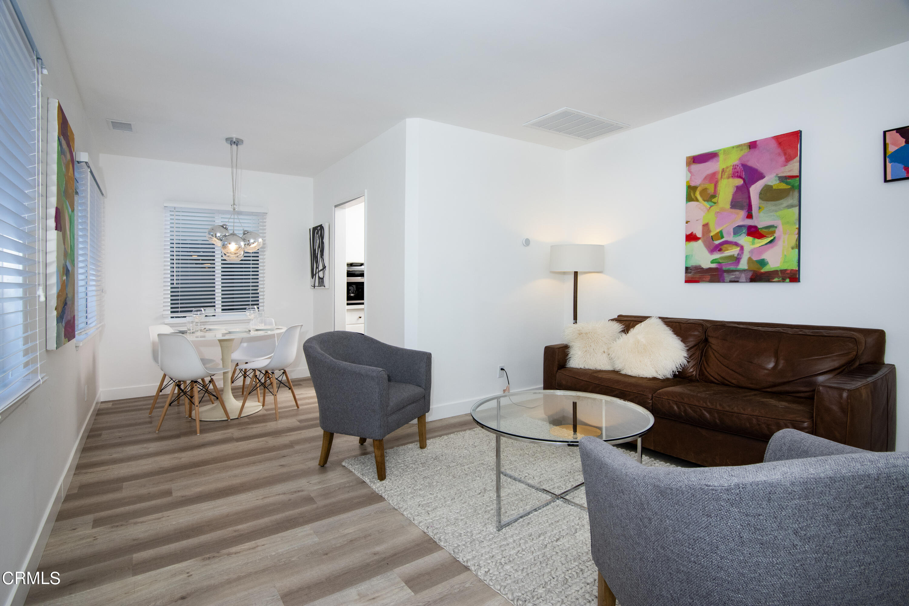 2935 Morningside Street Pasadena, CA 91107 - Photo 9 of 31 a living room with furniture and a painting on the wall