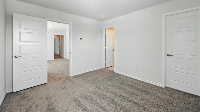 wooden floor and closet in a room