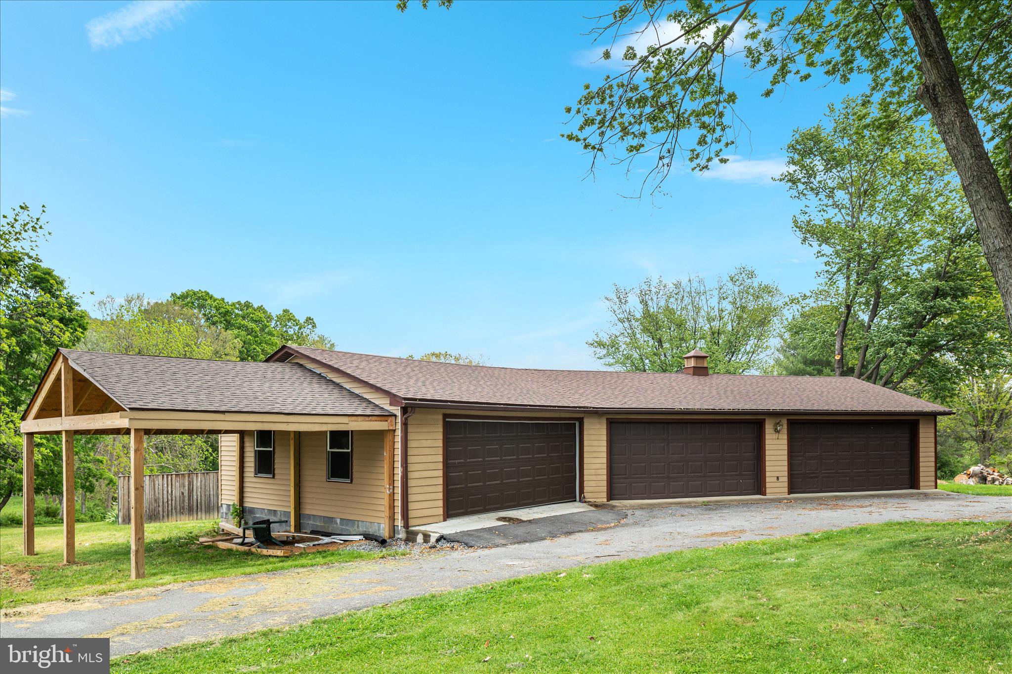 263 Bowling Green Road Front Royal, VA 22630 - Photo 45 of 75 front view of a house with a yard