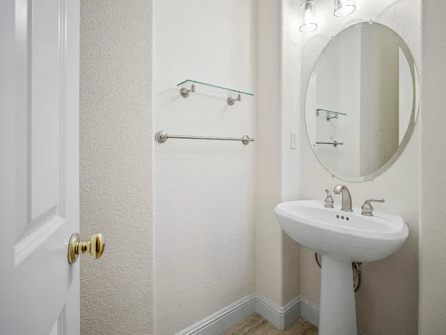 a view of a backyard with potted plants