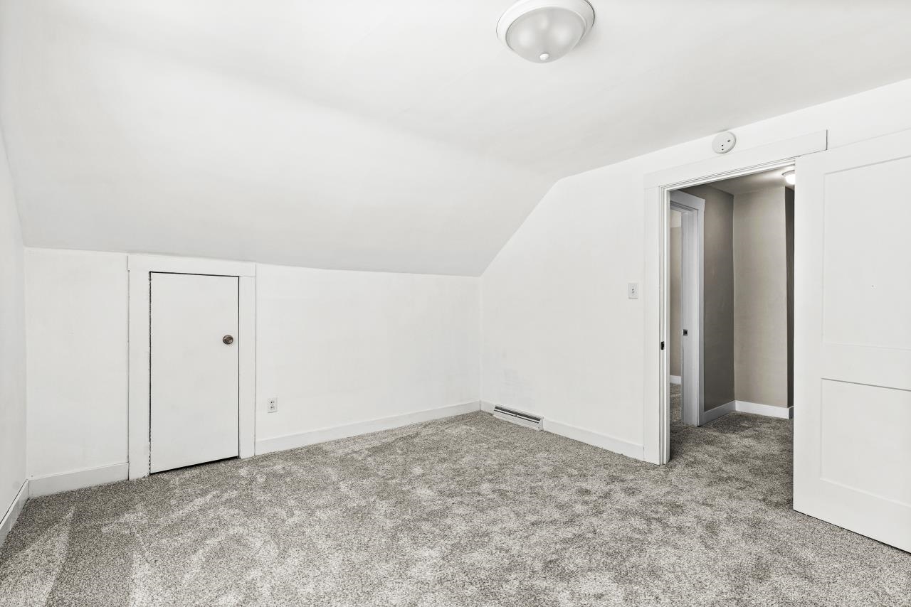 310 3rd Street Cloquet, MN 55720 - Photo 28 of 39 Additional living space featuring lofted ceiling and light carpet