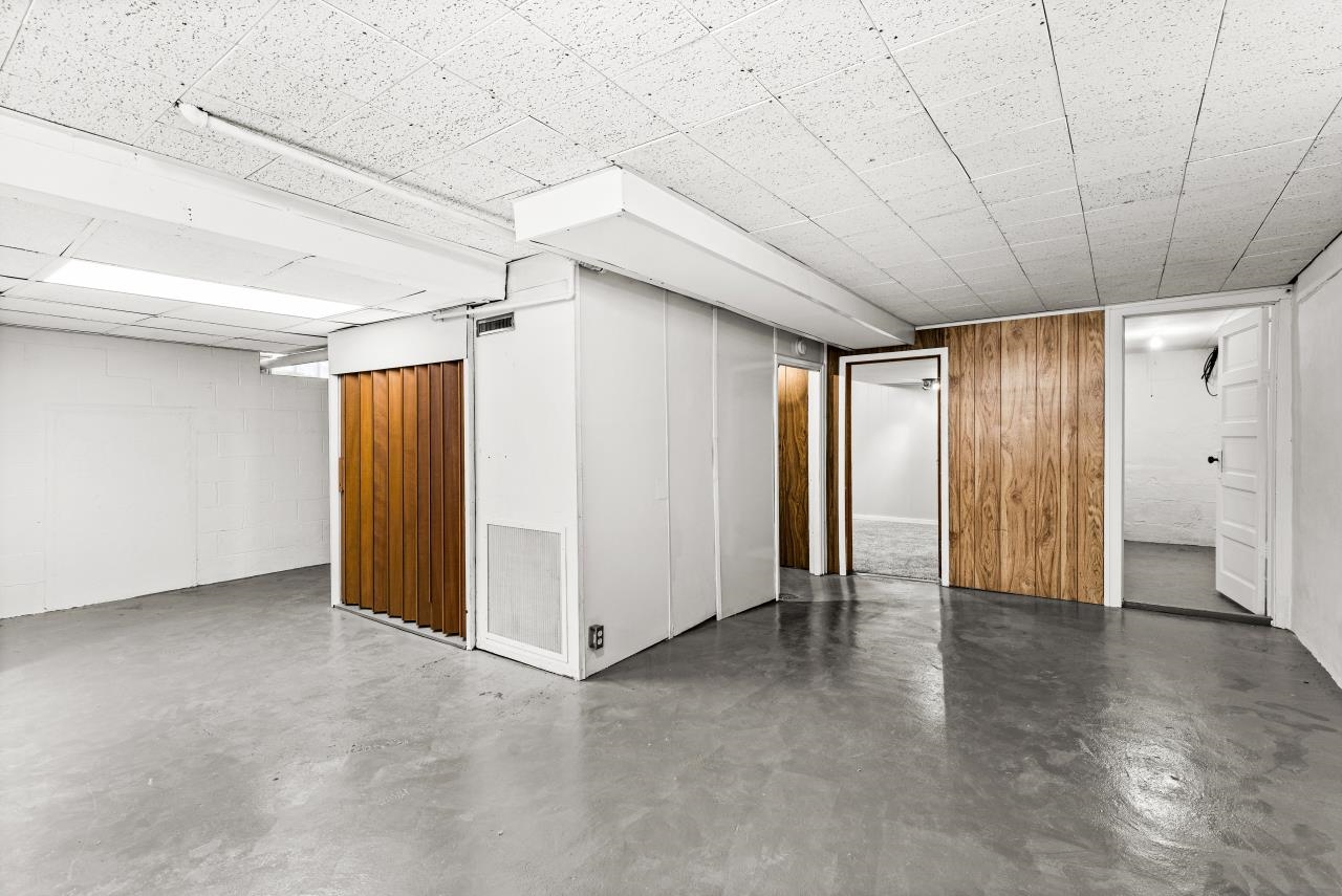 310 3rd Street Cloquet, MN 55720 - Photo 38 of 39 Finished basement featuring concrete block wall