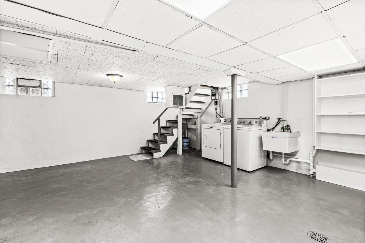 310 3rd Street Cloquet, MN 55720 - Photo 39 of 39 Basement featuring separate washer and dryer and a drop ceiling