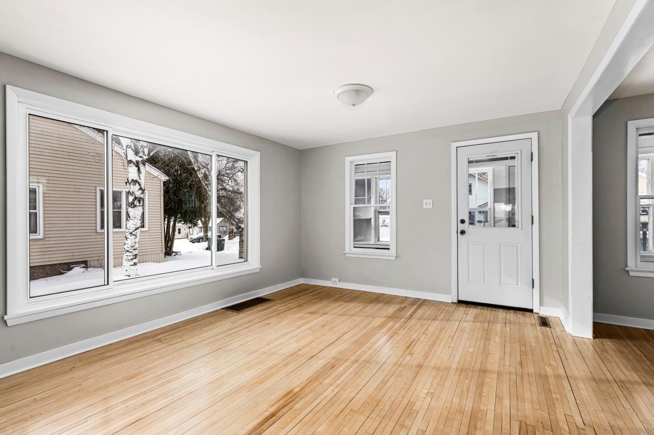 310 3rd Street Cloquet, MN 55720 - Photo 4 of 39 Entrance foyer with light wood-style floors and baseboards
