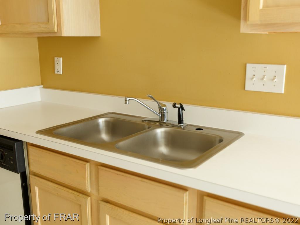 218 Larchmont Road Fayetteville, NC 28311 - Photo 14 of 28 a close view of sink and tap