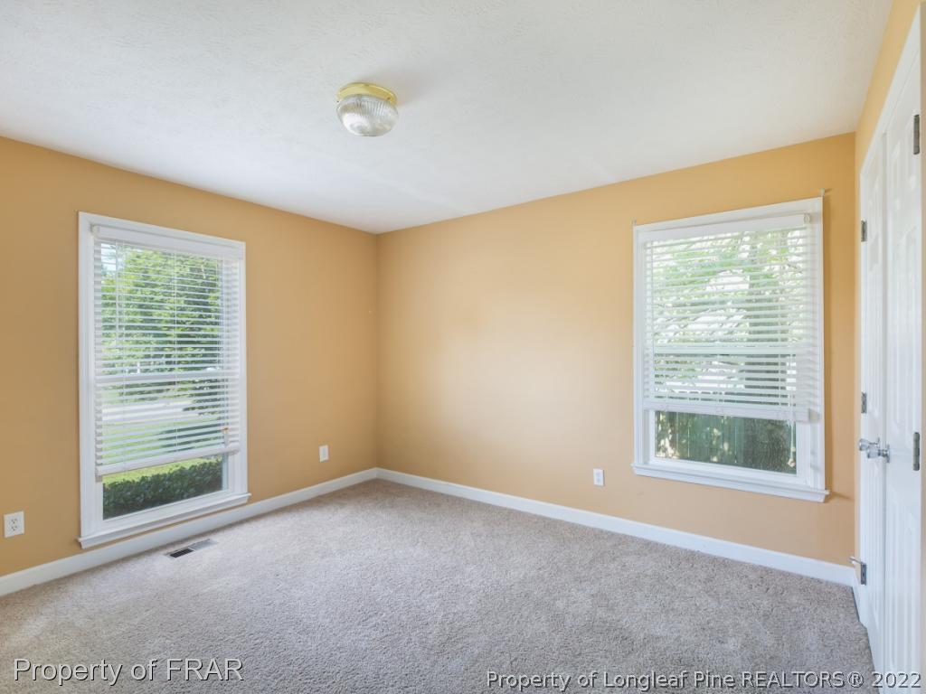 218 Larchmont Road Fayetteville, NC 28311 - Photo 18 of 28 a view of an empty room with a window