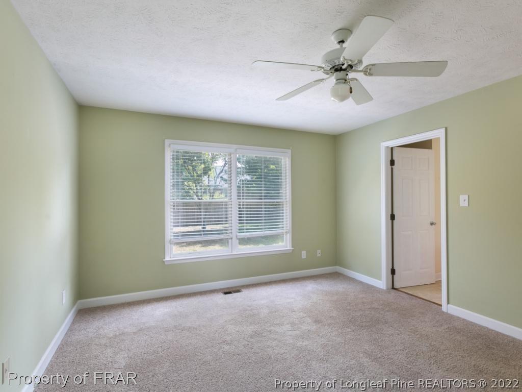 218 Larchmont Road Fayetteville, NC 28311 - Photo 22 of 28 a view of an empty room with a window