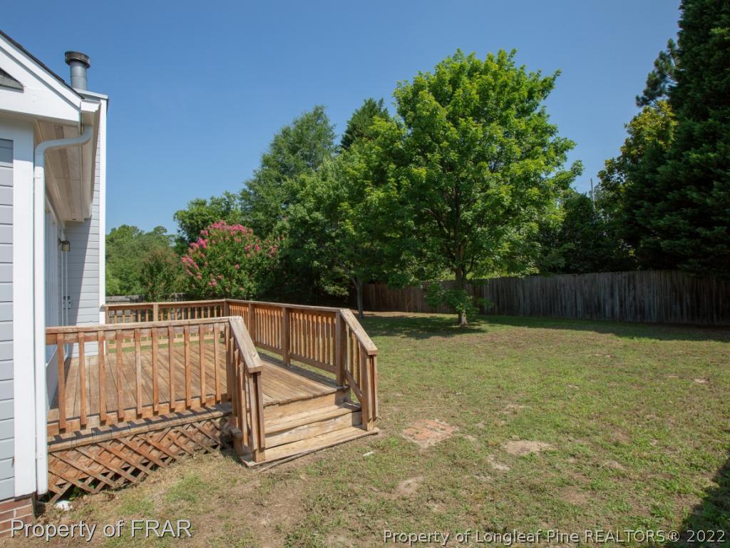 218 Larchmont Road Fayetteville, NC 28311 - Photo 26 of 28 a view of backyard with small swimming pool