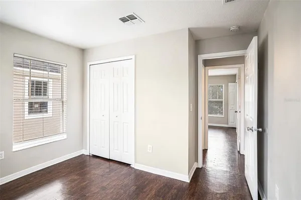 a view of a room that has a window in it