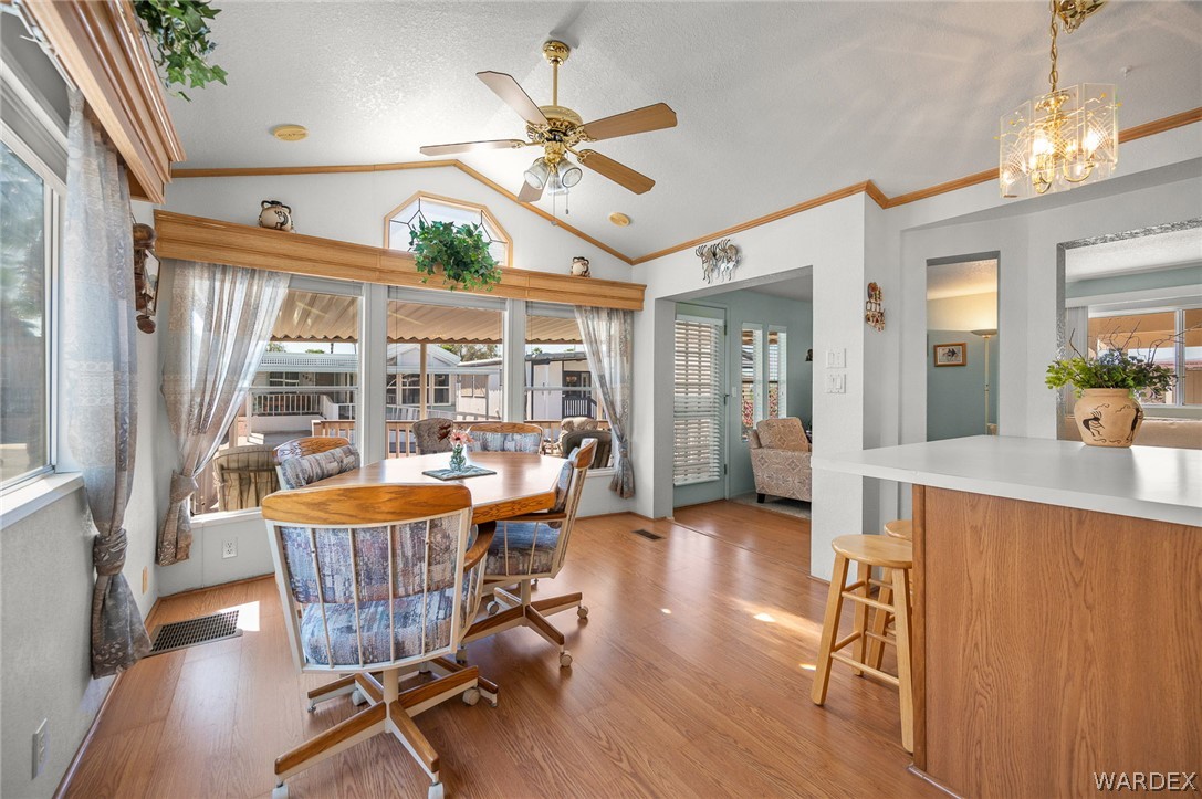 2000 Ramar Road, Unit 158 Bullhead City, AZ 86442 - Photo 26 of 78 Light-filled dining space with large windows and elevated ceilings? creating an airy, open feel throughout.