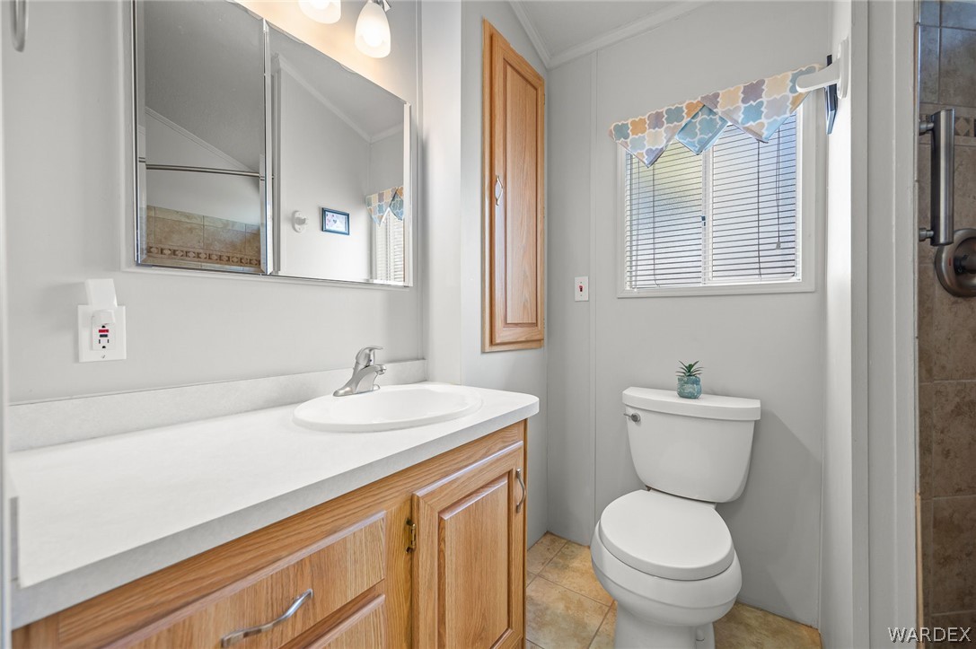 2000 Ramar Road, Unit 158 Bullhead City, AZ 86442 - Photo 33 of 78 Light and bright bathroom featuring an updated vanity and a beautifully tiled walk-in shower? clean, modern, and easy to maintain.