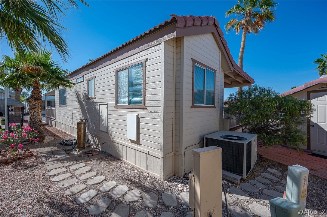 2000 Ramar Road, Unit 158 Bullhead City, AZ 86442 - Photo 43 of 78 Well-maintained exterior with easy-care desert landscaping? designed for low maintenance living.