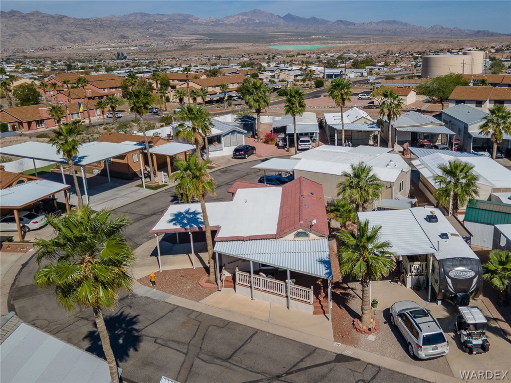 2000 Ramar Road, Unit 158 Bullhead City, AZ 86442 - Photo 51 of 78 Welcoming front porch with covered seating area? perfect for relaxing and enjoying the surroundings.