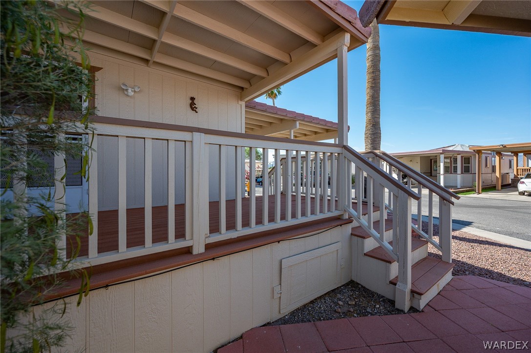 2000 Ramar Road, Unit 158 Bullhead City, AZ 86442 - Photo 9 of 78 Spacious covered porch with easy access and plenty of room for outdoor seating? ideal for relaxing or entertaining.