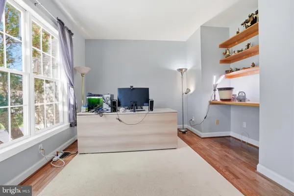a view of kitchen with furniture and window