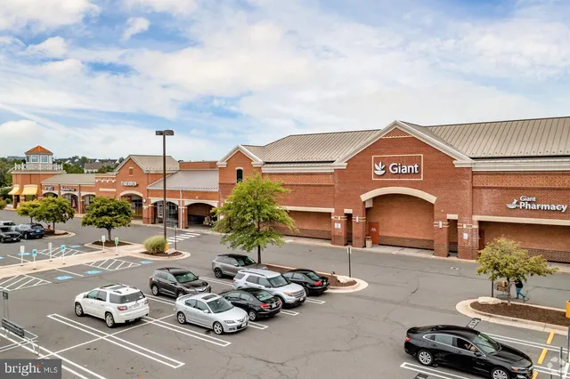 a group of cars parked in front of a building