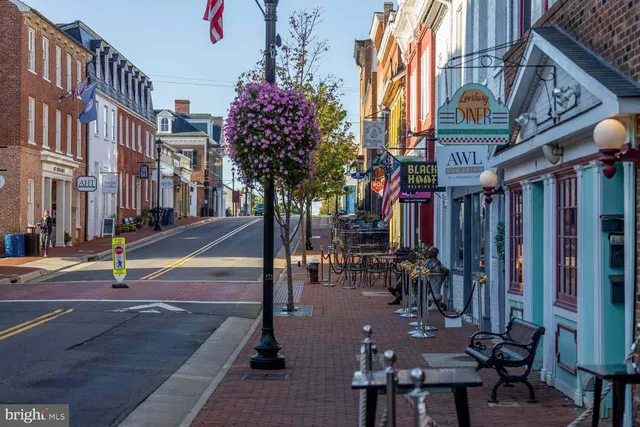 a view of a street with sitting area