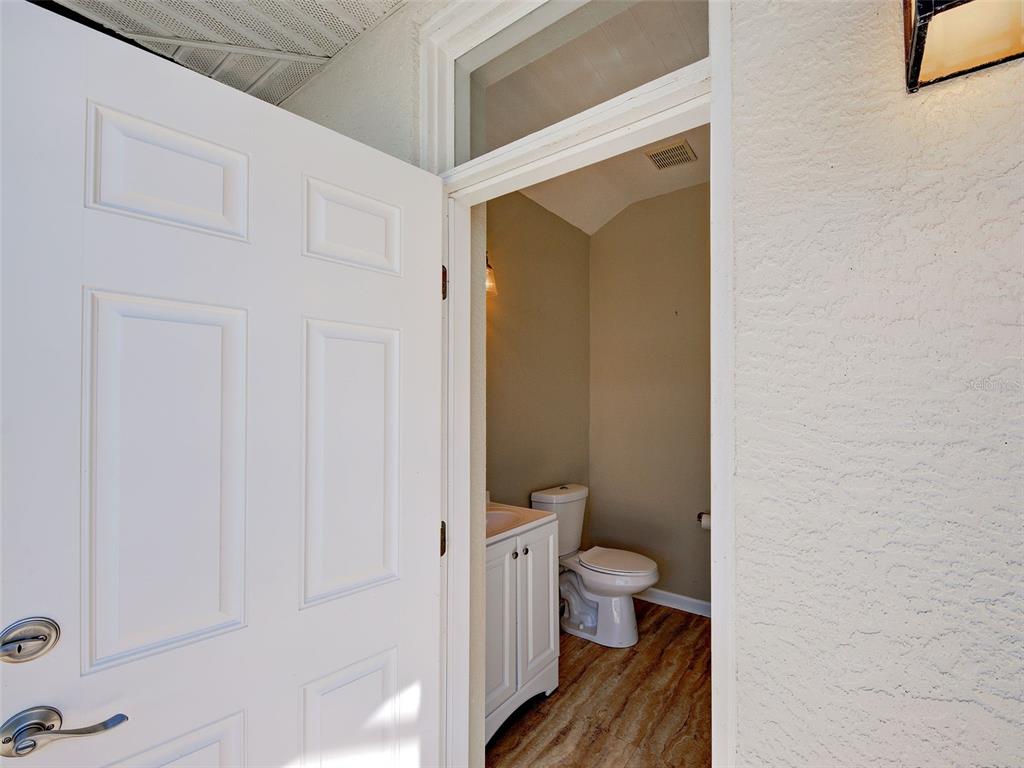 45 Tee View Road Rotonda West, FL 33947 - Photo 56 of 64 a bathroom with a toilet and a shower