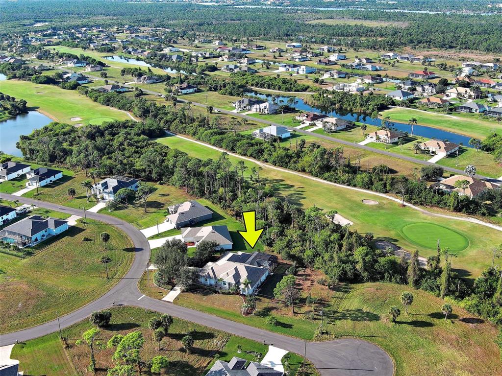 45 Tee View Road Rotonda West, FL 33947 - Photo 59 of 64 an aerial view of a city with lots of residential buildings