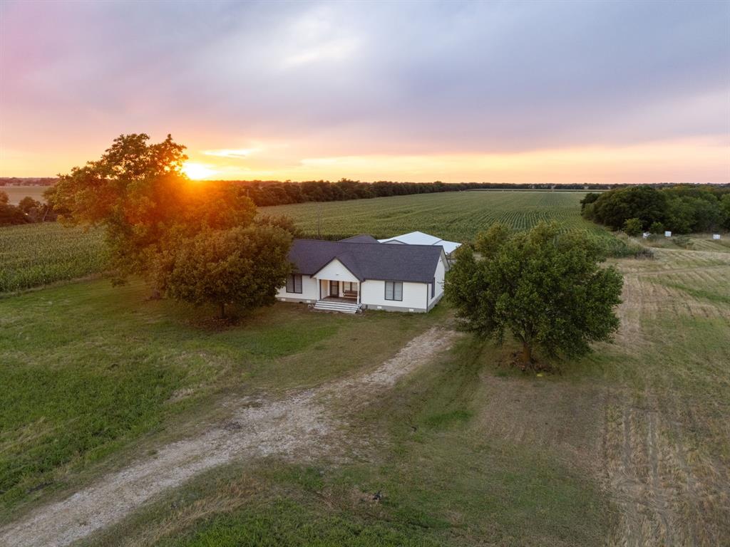 300 Grellhesl Road West, TX 76691 - Photo 2 of 35 a view of a lake with houses in the back