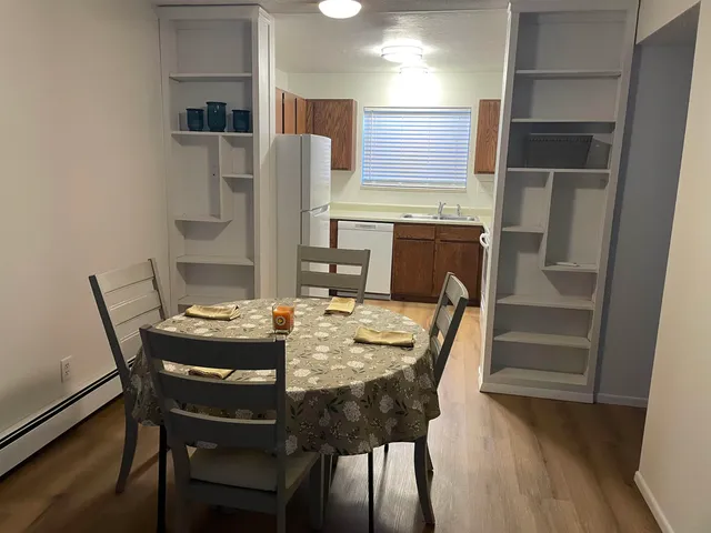 a kitchen with a sink cabinets and appliances