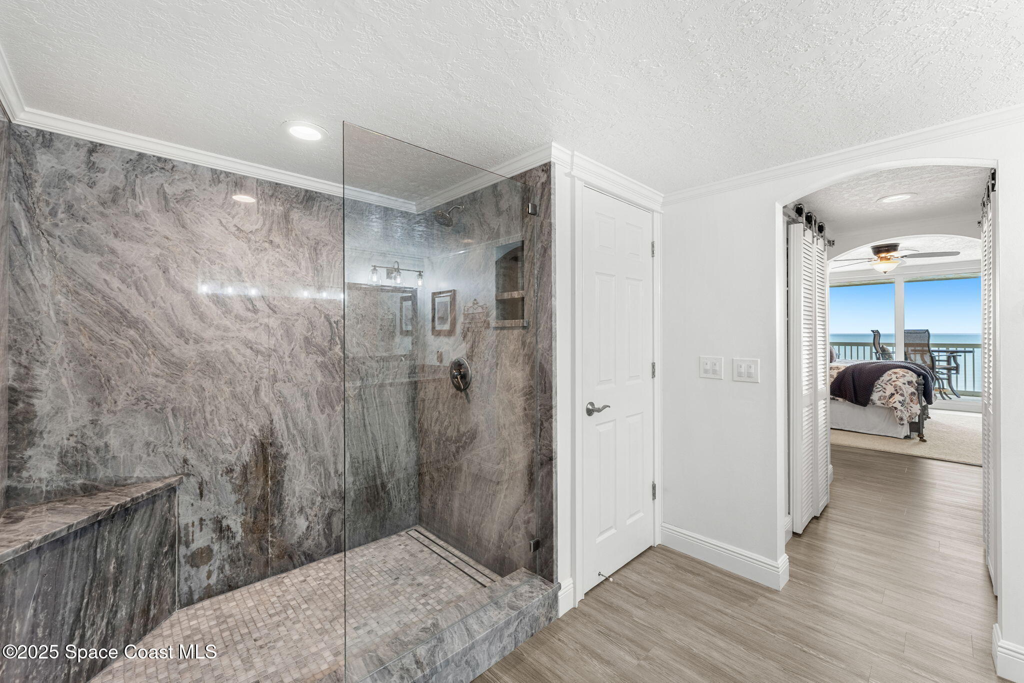 407 Florida A1A, Unit 464 Satellite Beach, FL 32937 - Photo 18 of 38 a bathroom with a shower and a sink