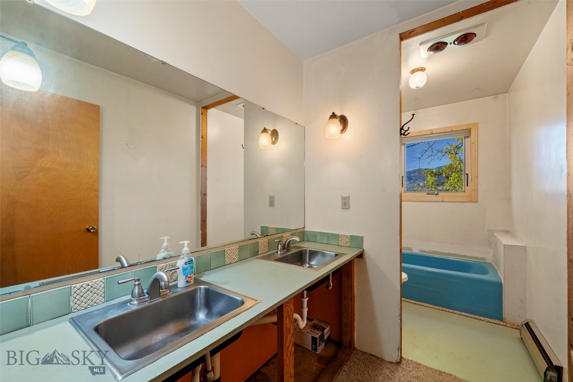 5970 Penwell Bridge Road Belgrade, MT 59714 - Photo 19 of 28 Main floor full bathroom