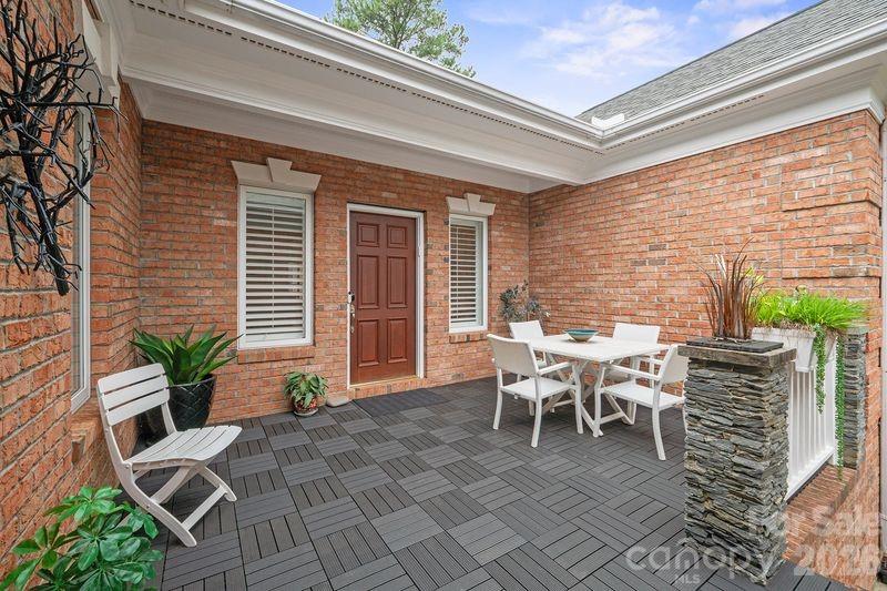 17426 Springwinds Drive, Unit 122 Cornelius, NC 28031 - Photo 11 of 36 a outdoor space with furniture