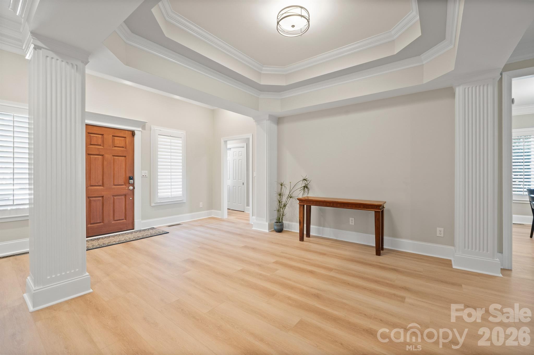 17426 Springwinds Drive, Unit 122 Cornelius, NC 28031 - Photo 5 of 36 a view of an empty room and window