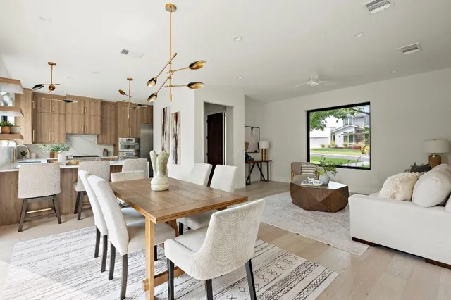 a view of a dining room with furniture