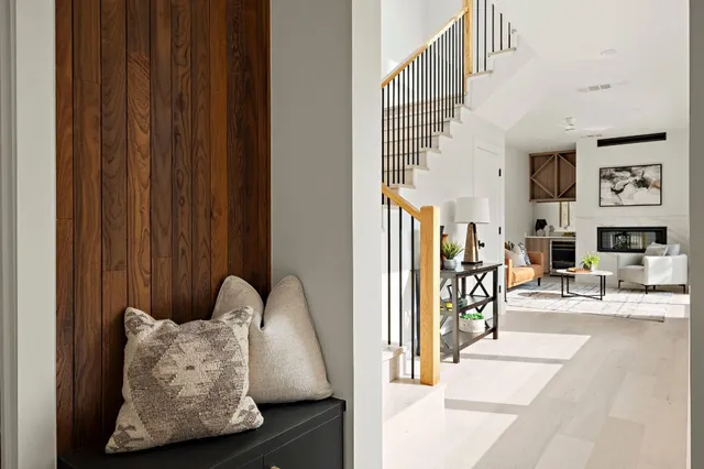 a view of entryway and hall with living room