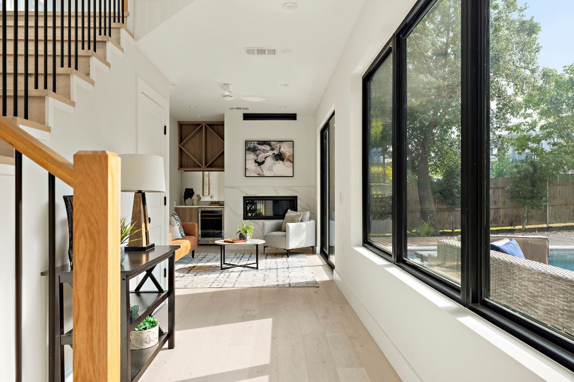 1805 Frazier Avenue Austin, TX 78704 - Photo 15 of 35 a living room with fireplace furniture and a large window