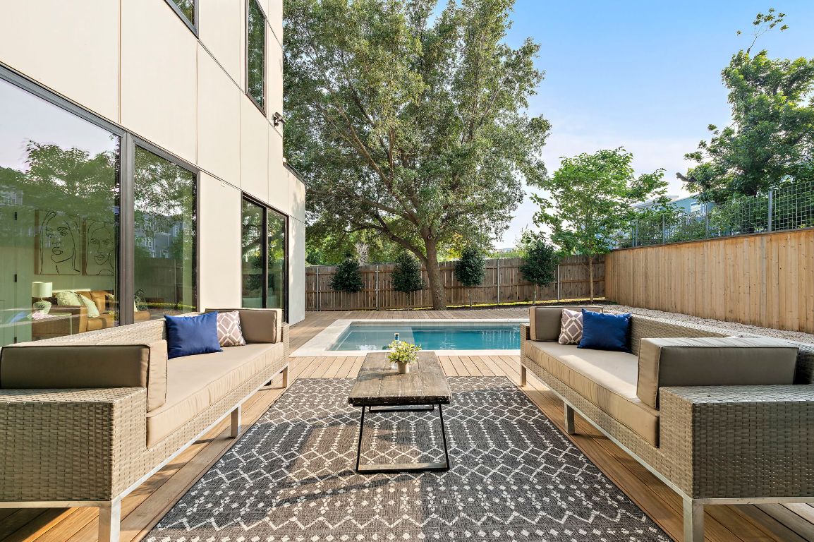 1805 Frazier Avenue Austin, TX 78704 - Photo 27 of 35 a view of patio with couches table and chairs and potted plants